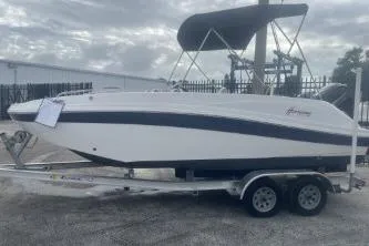 Slide: The Image of 2022 Hurricane SunDeck Sport 192 RL OB boat on trailer, outdoor display. - 6