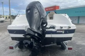 Slide: The Image of 2021 Hurricane SunDeck Sport 192 RL OB boat, rear view with outboard motor. - 5