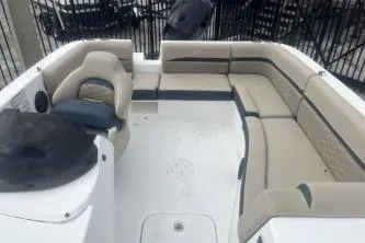 Slide: The Image of 2021 Hurricane SunDeck Sport 192 RL OB boat interior with spacious seating. - 8