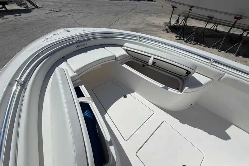 Slide: The Image of 2016 Contender 24 Sport boat interior with open storage compartments. - 22