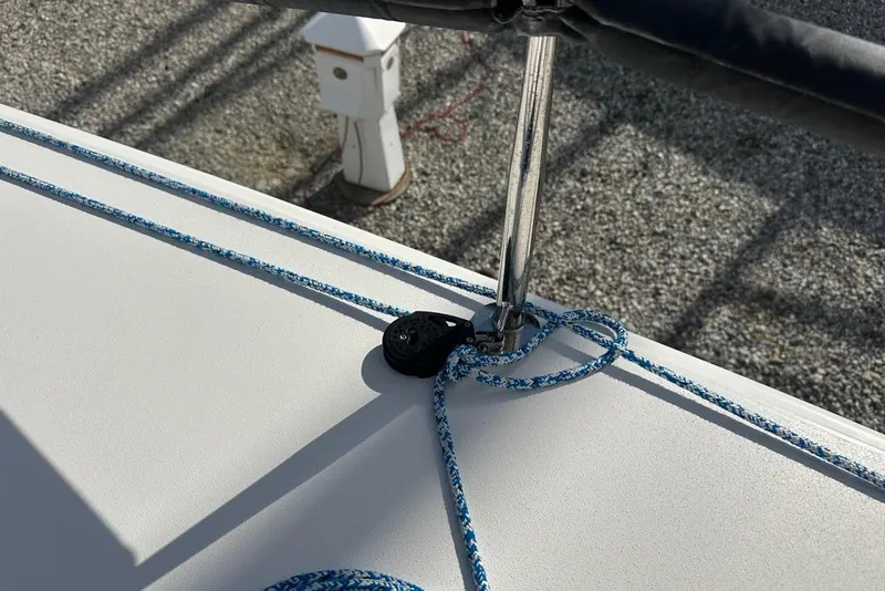 Slide: The Image of Close-up of 2016 J Boats J/70 deck with blue rope and pulley system. - 12