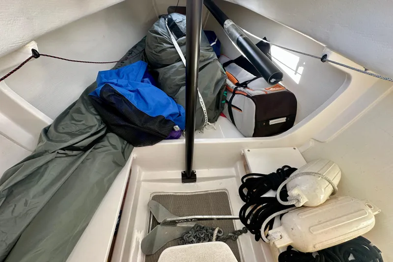 Slide: The Image of Interior of a 2016 J Boats J/70 sailboat with gear and equipment. - 15