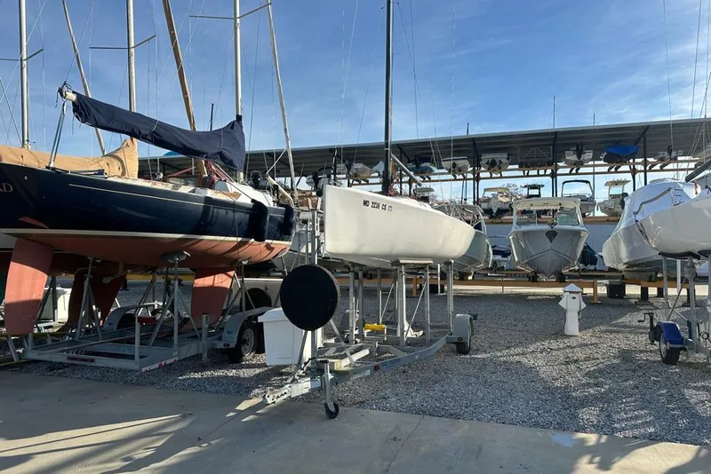Slide: The Image of 2016 J Boats J/70 sailboat on trailer in marina storage area. - 3