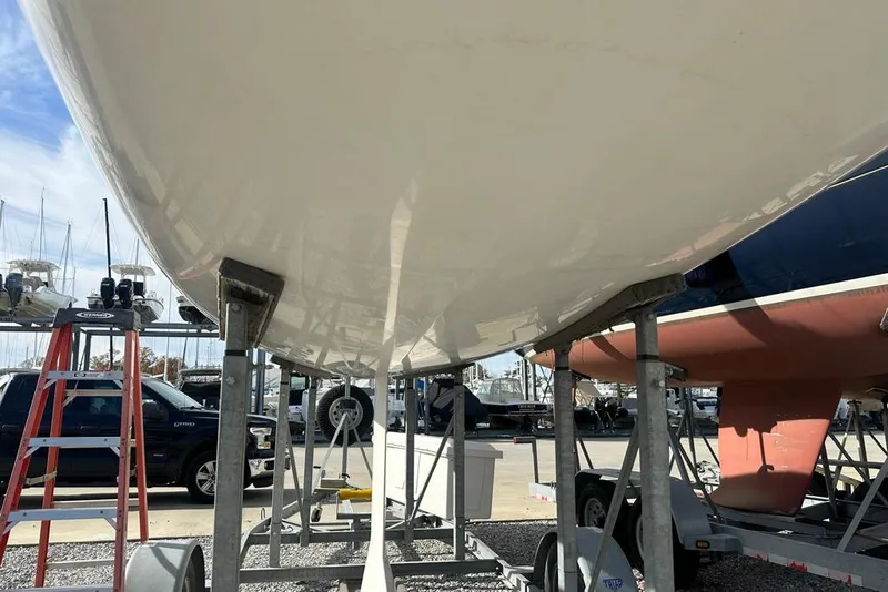 Slide: The Image of 2016 J Boats J/70 sailboat on trailer in marina setting. - 6