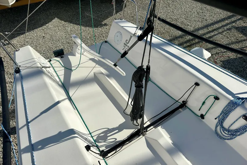 Slide: The Image of 2016 J Boats J/70 sailboat cockpit with rigging and ropes on deck. - 7