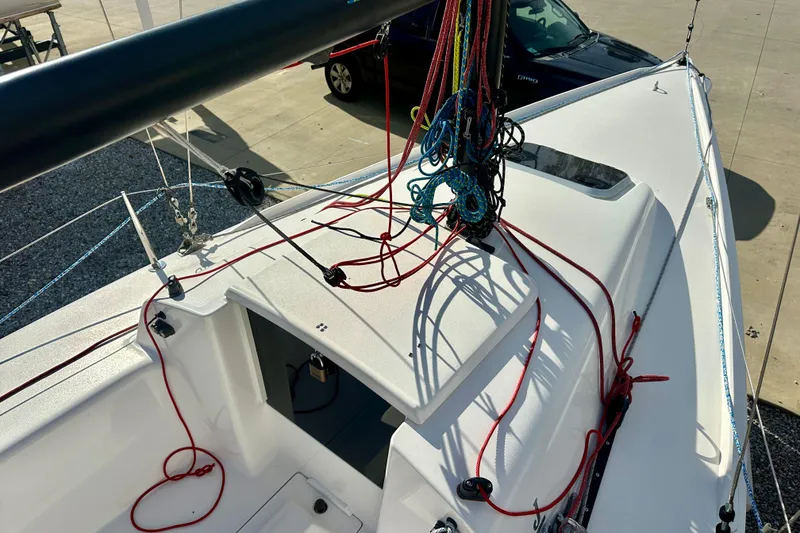 Slide: The Image of 2016 J Boats J/70 sailboat deck with colorful rigging and ropes. - 8
