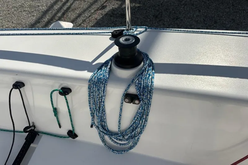 Slide: The Image of Close-up of 2016 J Boats J/70 sailboat deck with ropes and winch. - 9