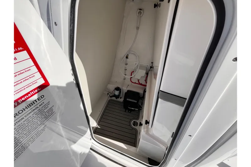Slide: The Image of Interior view of 2026 Tidewater 2500 Carolina Bay boat's storage compartment. - 12