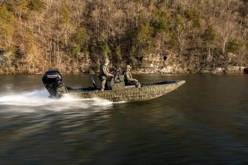 Slide: The Image of 2026 Lowe Roughneck RX1860 Tunnel Jet boat with Mercury engine on trailer. - 2