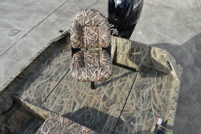 Slide: The Image of Trailer hitch of 2026 Lowe Roughneck RX1860 Tunnel Jet on concrete surface. - 26