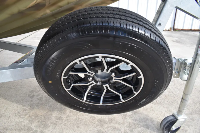 Slide: The Image of Camouflage interior of 2026 Lowe Roughneck RX1860 Tunnel Jet boat. - 27