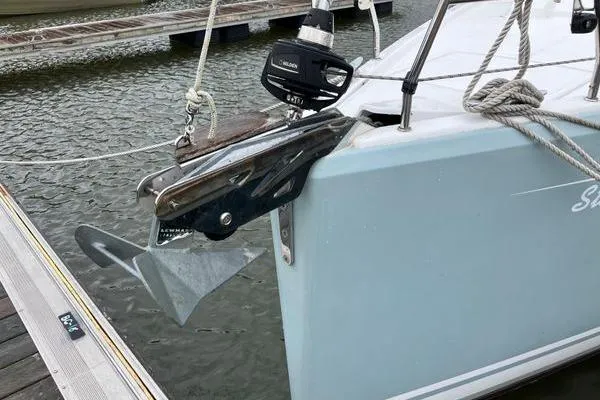 Slide: The Image of 2017 Hanse 315 sailboat anchor and bow detail at marina dock. - 18