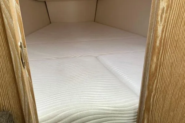 Slide: The Image of Interior cabin of 2017 Hanse 315 yacht with comfortable bedding. - 32