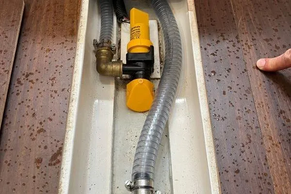 Slide: The Image of Bilge pump system on 2017 Hanse 315 yacht, featuring hoses and valves. - 38