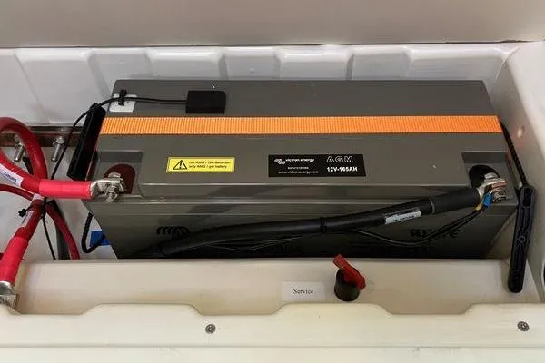Slide: The Image of AGM battery in a 2017 Hanse 315 yacht, securely installed with visible wiring. - 39