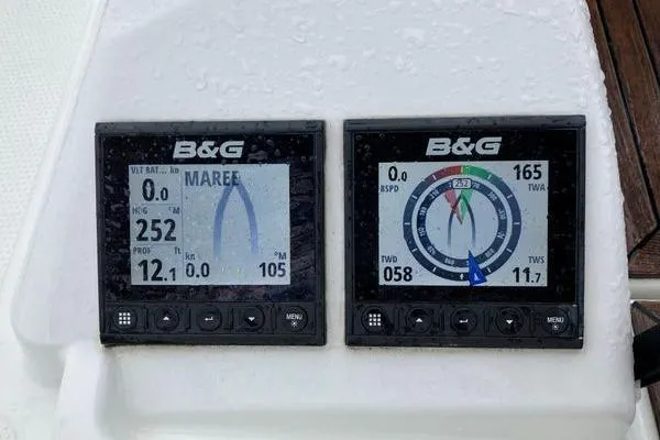 Slide: The Image of B&G navigation displays on a 2017 Hanse 315 yacht, showing speed and wind data. - 4