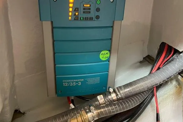 Slide: The Image of Battery charger in a 2017 Hanse 315 sailboat, featuring ChargeMaster 12/35-3 model. - 41