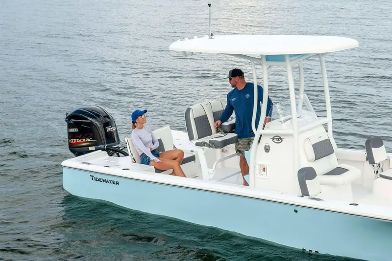 Slide: The Image of 2026 Tidewater 2300 Carolina Bay boat with Yamaha engine on trailer at dealership. - 2