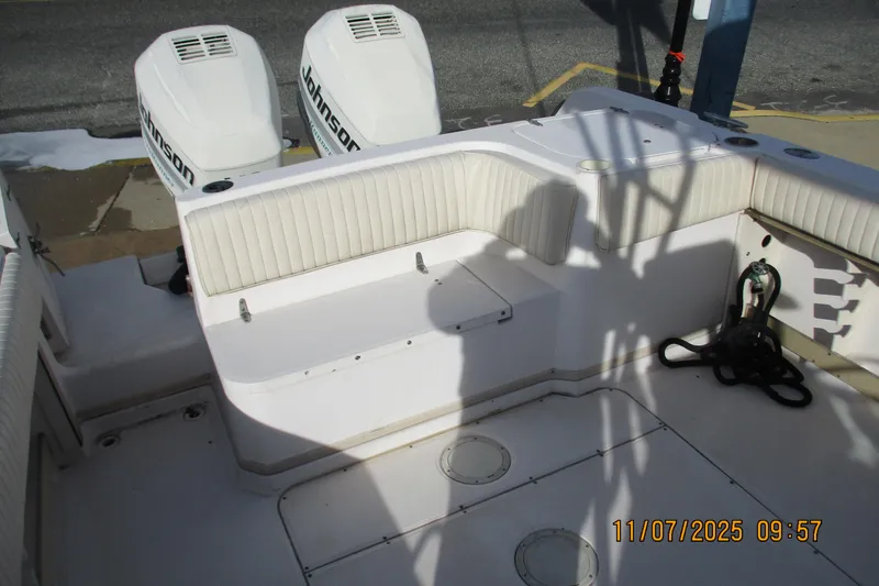 Slide: The Image of 1996 Grady-White Sailfish 272 boat interior with Johnson outboard motors. - 23