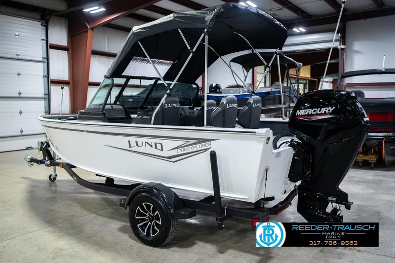 Slide: The Image of 2026 Lund 1700 Explorer Sport boat with Mercury engine in showroom. - 10