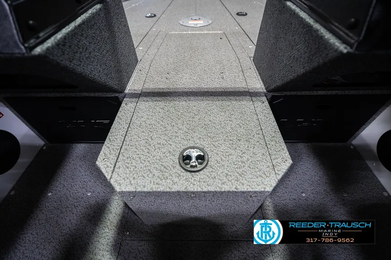 Slide: The Image of 2026 Lund 1700 Explorer Sport boat interior with textured flooring and storage compartment. - 28