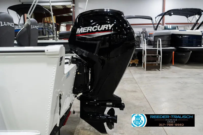 Slide: The Image of 2026 Lund 1700 Explorer Sport with Mercury outboard motor in showroom. - 43