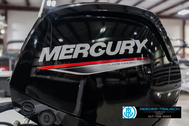 Slide: The Image of Mercury FourStroke engine on 2026 Lund 1700 Explorer Sport boat in showroom. - 44