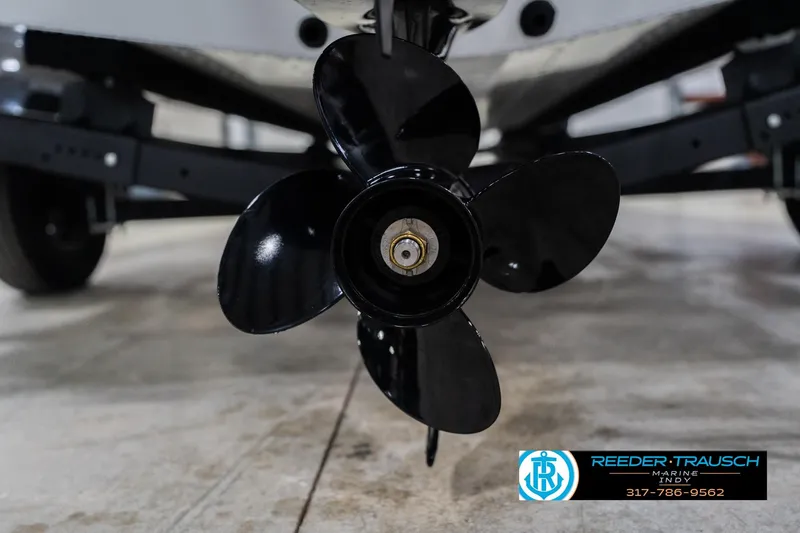 Slide: The Image of 2026 Lund 1700 Explorer Sport boat propeller close-up in showroom. - 47
