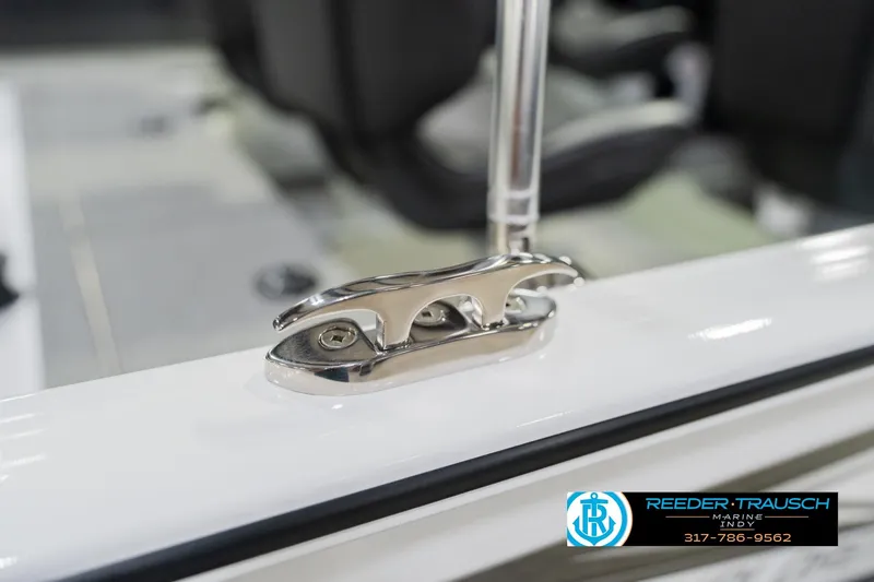 Slide: The Image of 2026 Lund 1700 Explorer Sport boat cleat detail with Reeder-Trausch Marine logo. - 56