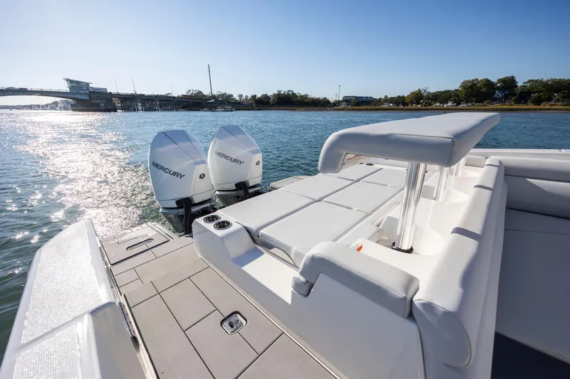 Slide: The Image of 2023 Aviara AV32 OB boat with dual Mercury outboard engines on a sunny day. - 15