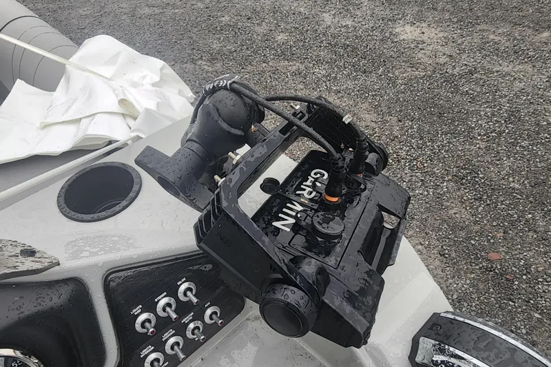 Slide: The Image of Wet dashboard of 2021 Lowe SS 230 WT boat with Jensen audio system. - 28