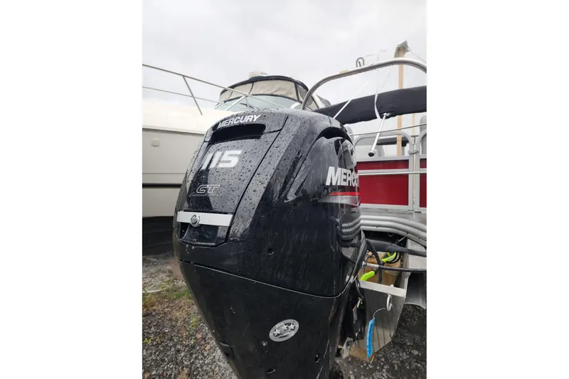 Slide: The Image of 2021 Lowe SS 230 WT capacity label: 12 persons or 1639 lbs, safety warnings included. - 33