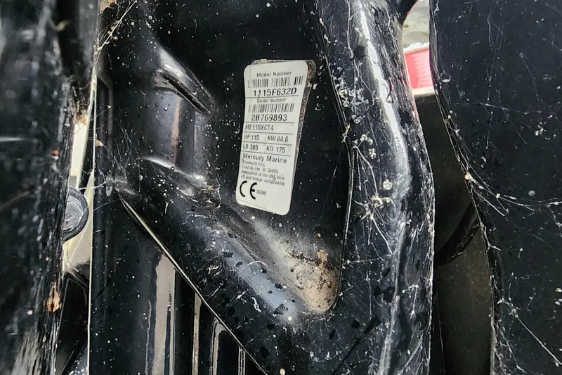 Slide: The Image of Close-up of a 2021 Lowe SS 230 WT model number label on a black surface. - 35