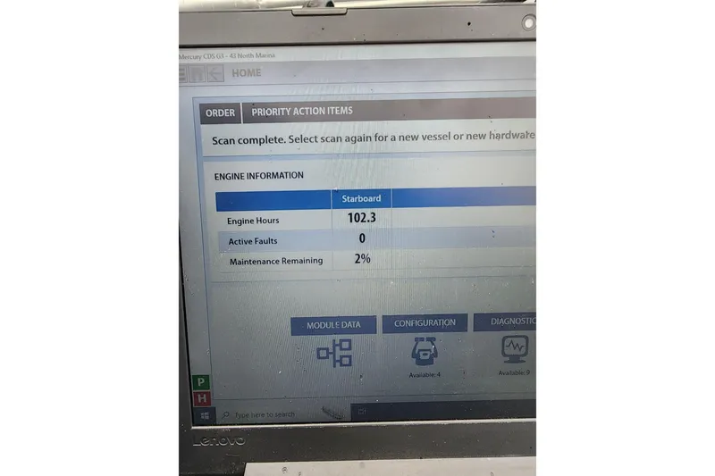 Slide: The Image of Laptop screen displaying engine diagnostics for 2021 Lowe SS 230 WT boat. - 37
