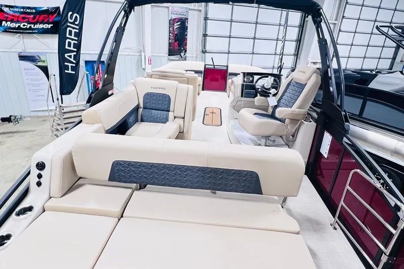 Slide: The Image of 2025 Harris Solstice 250 boat interior with luxurious seating and modern design. - 24