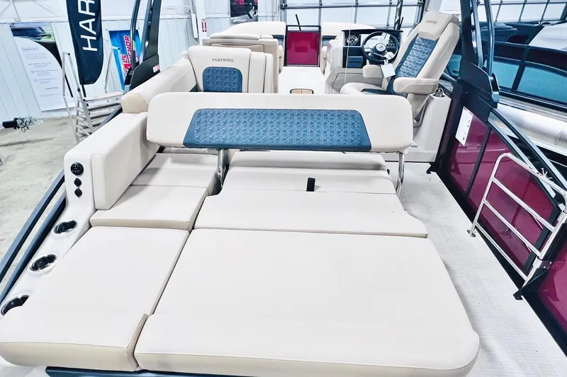 Slide: The Image of 2025 Harris Solstice 250 boat interior with luxurious seating and modern design. - 27