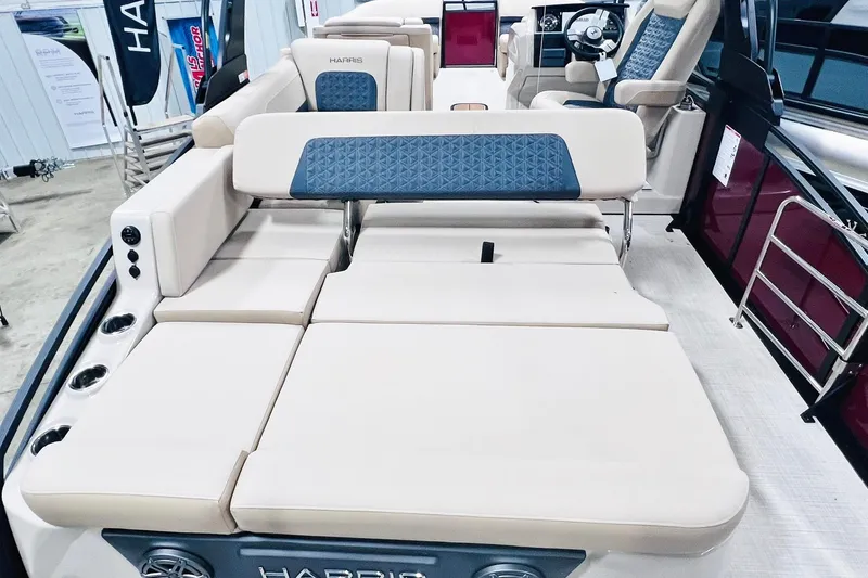 Slide: The Image of 2025 Harris Solstice 250 boat interior with luxurious seating and modern design. - 28