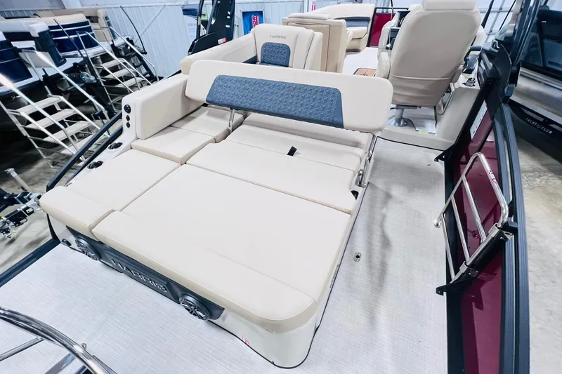 Slide: The Image of 2025 Harris Solstice 250 boat interior with luxurious seating and modern design. - 30