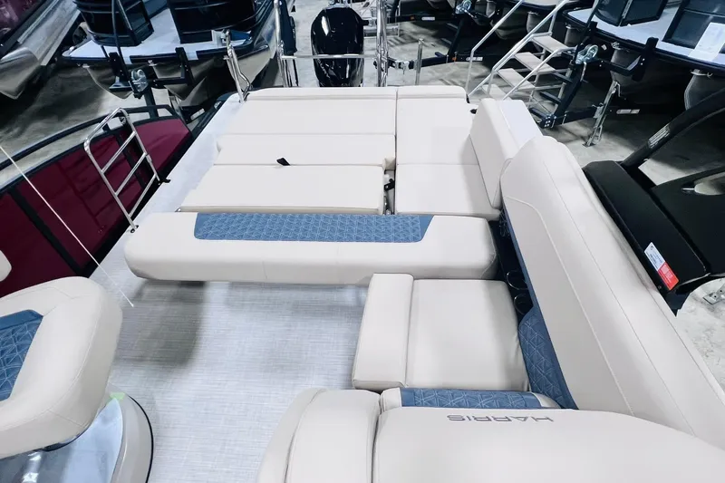 Slide: The Image of 2025 Harris Solstice 250 boat interior with luxurious seating and modern design. - 34