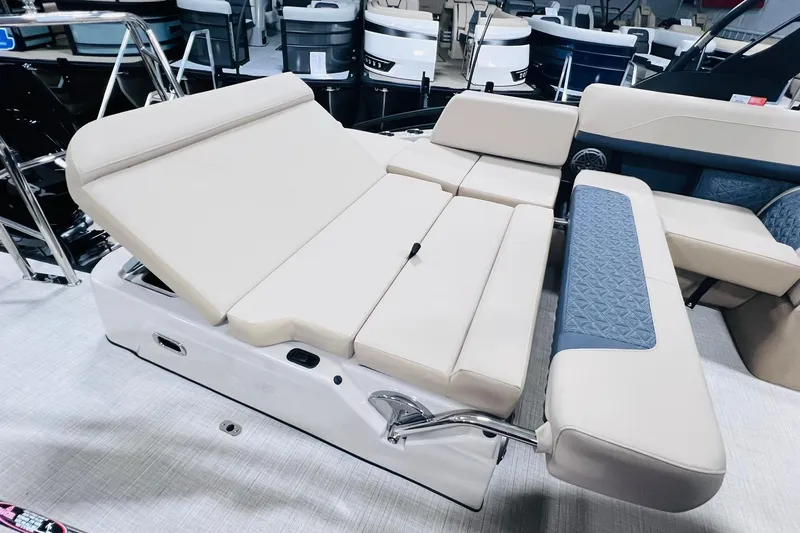 Slide: The Image of 2025 Harris Solstice 250 boat interior with adjustable seating and modern design. - 36