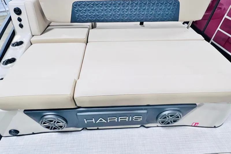 Slide: The Image of 2025 Harris Solstice 250 boat seating with beige cushions and integrated speakers. - 37