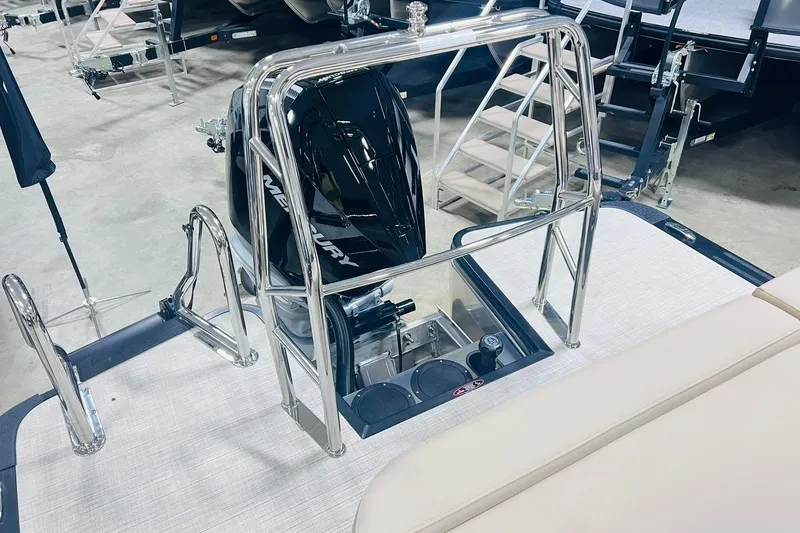 Slide: The Image of 2025 Harris Solstice 250 boat with Mercury engine and sleek stainless steel railings. - 42