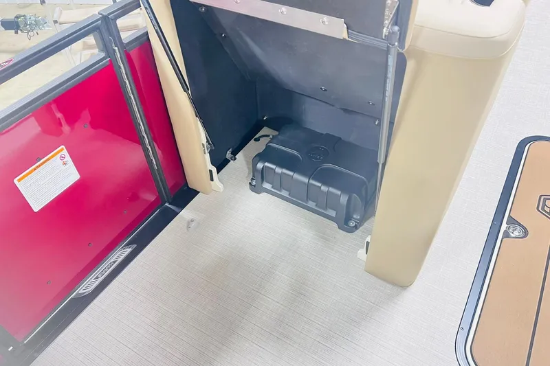 Slide: The Image of 2025 Harris Solstice 250 interior detail showing storage compartment and flooring. - 49