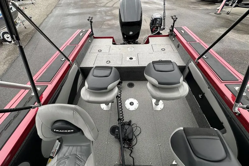 Slide: The Image of 2019 Tracker Targa V-19 Combo boat interior with seating and storage compartments. - 7