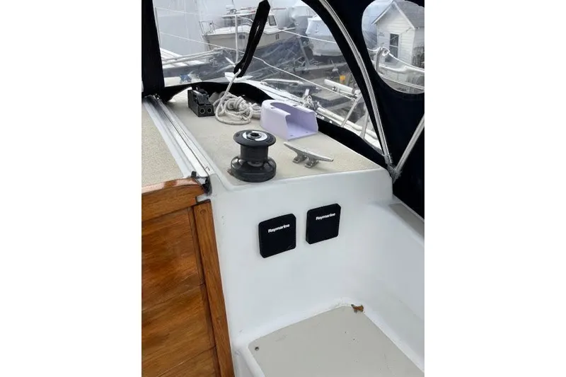 Slide: The Image of 1988 Tartan 31 Cutter Rigged Masthead Sloop cockpit with winch and navigation equipment. - 17