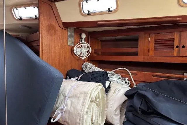 Slide: The Image of Interior of 1988 Tartan 31 Cutter Rigged Masthead Sloop with sails and ropes. - 28