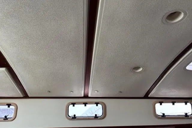 Slide: The Image of Interior ceiling of 1988 Tartan 31 Cutter Rigged Masthead Sloop with portholes. - 45