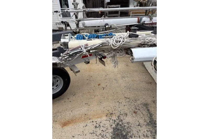 Slide: The Image of 1988 Tartan 31 Cutter Rigged Masthead Sloop mast and rigging on trailer. - 59