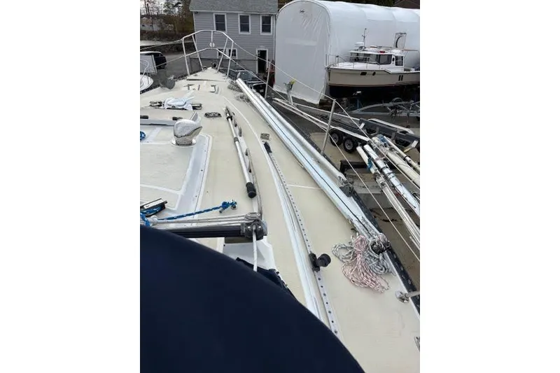 Slide: The Image of 1988 Tartan 31 Cutter Rigged Masthead Sloop deck view with rigging and equipment. - 8