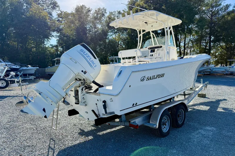 Slide: The Image of 2016 Sailfish 240 CC boat with Suzuki outboard motor on trailer. - 35